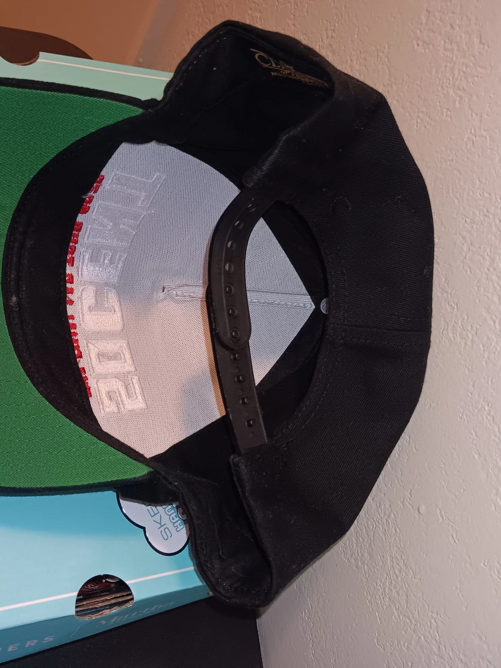 The Classic Black Snapback Hat with White and Red Embroidery